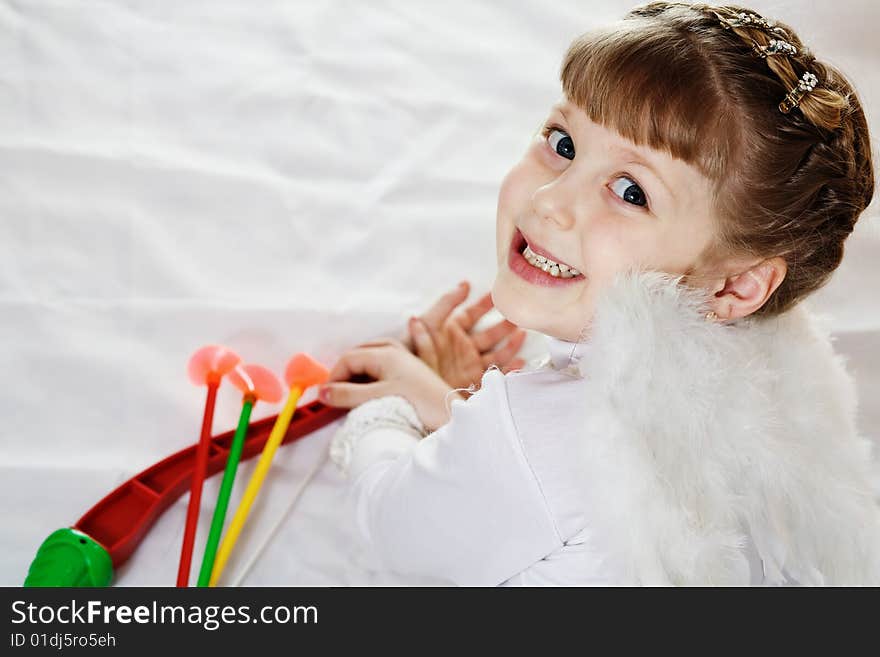 Stock photo: an image of a cupid with bow and arrows