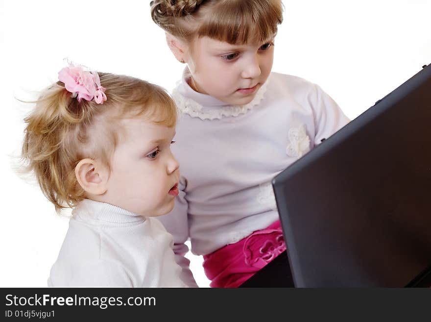 Stock photo: an image of two sisters with laptop