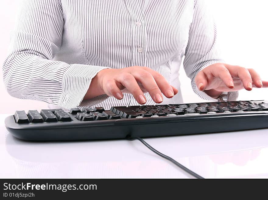 Woman typing on keyboard isolated on white