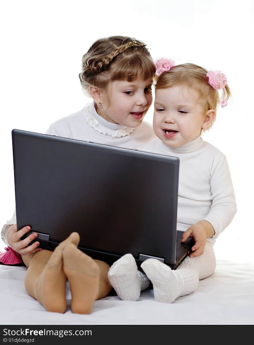 Stock photo: an image of two girls with laptop