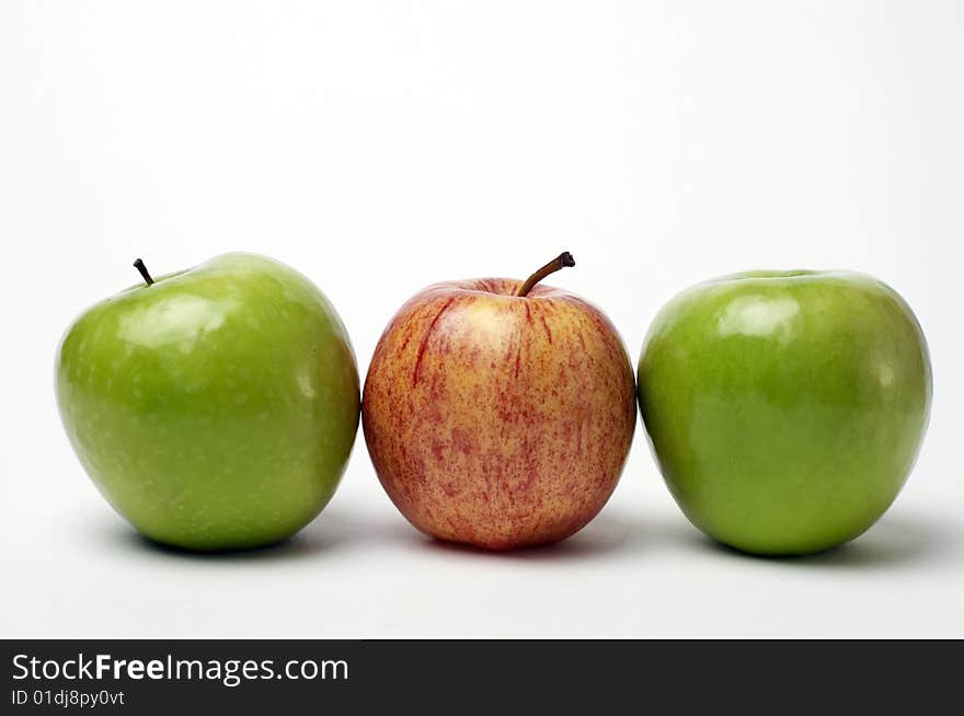 Red and green apples isolated on white background