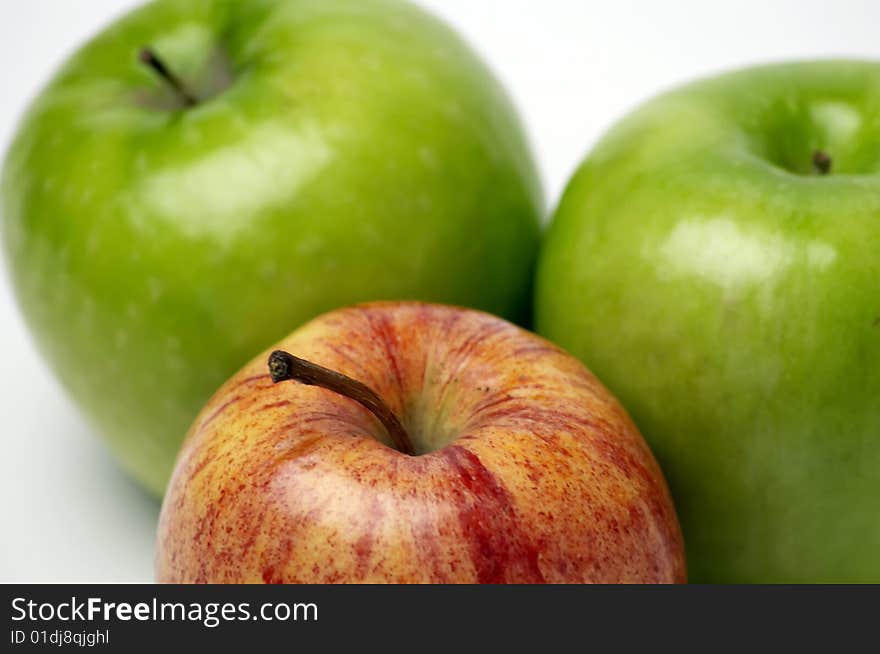 Red and green apples isolated on white