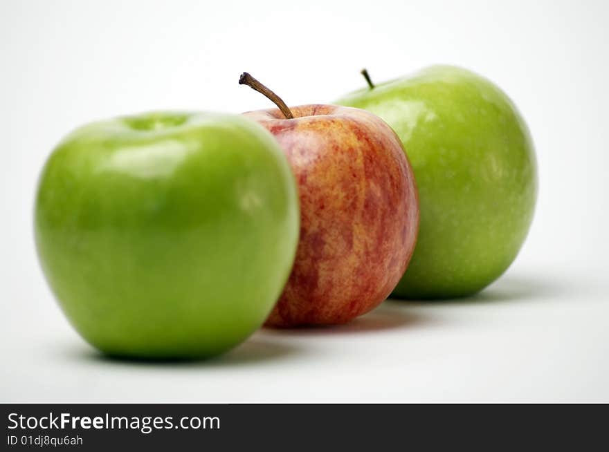 Red and green apples isolated on white background