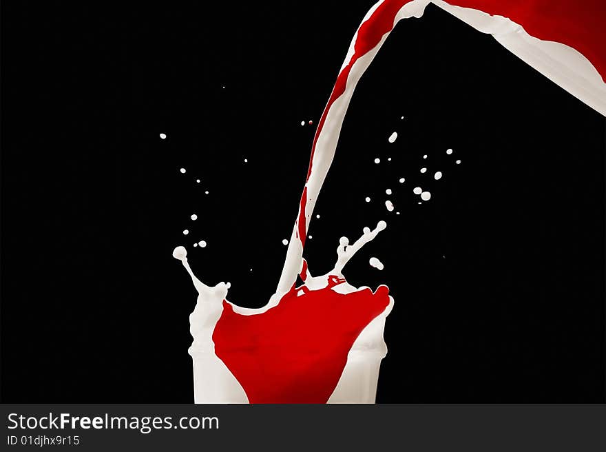 Blood and milk mixture on black background. Blood and milk mixture on black background