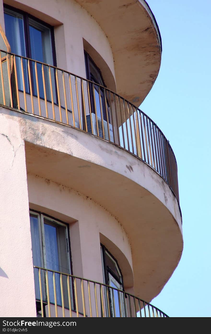 A detail of living house balcony with windows in Prague, Czech republic