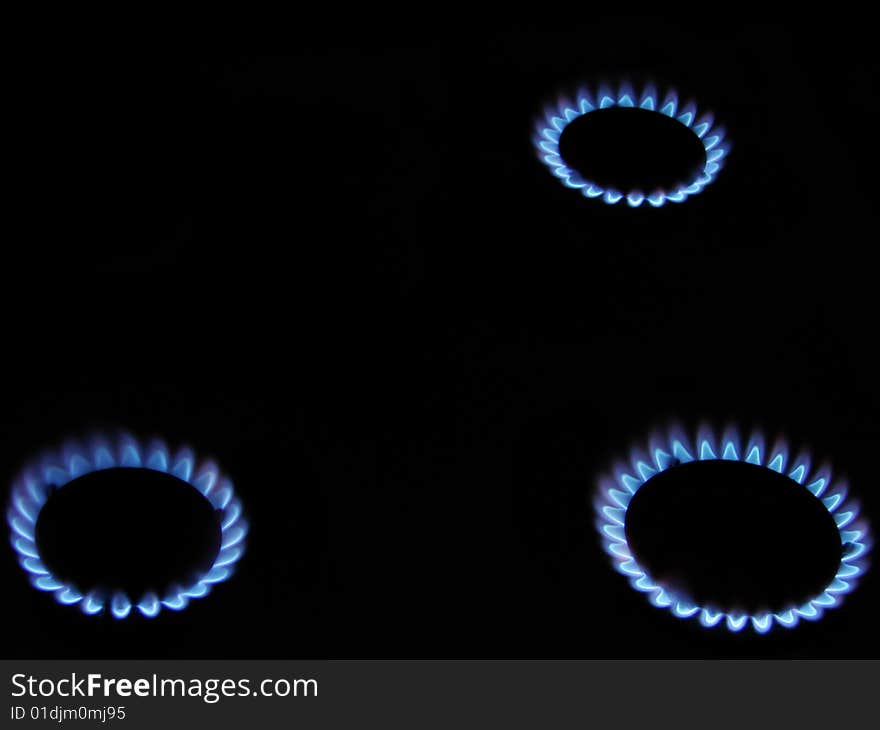 Flames of gas stove in the dark