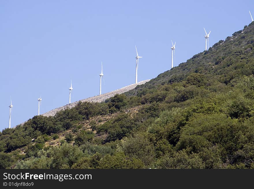 Wind Turbines Against Blue Sky