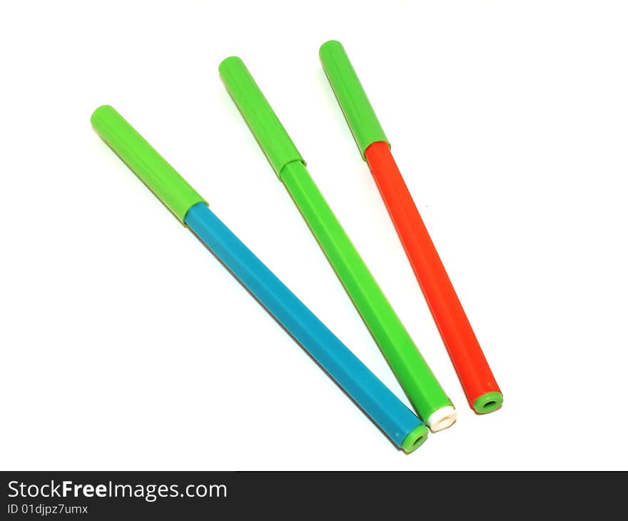 Photo of orange green blue markers. Photo of orange green blue markers