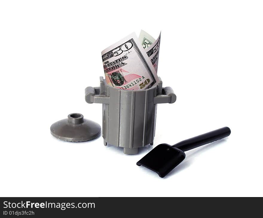 Photo of trash bucket with money