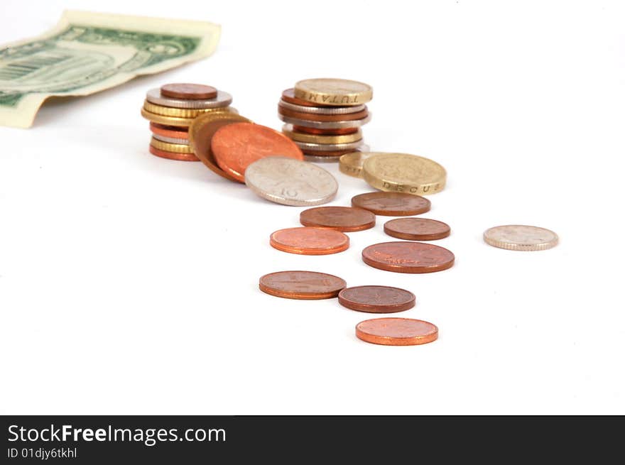 Five dollar paper money with worldwide coins isolated on the white background. Five dollar paper money with worldwide coins isolated on the white background.