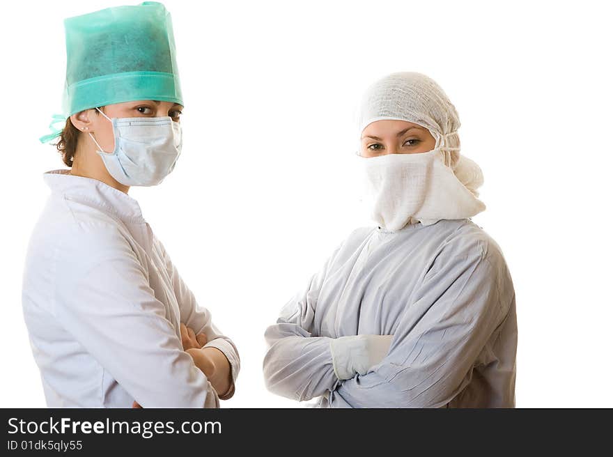 Portrait of two young doctors. Isolated on white background