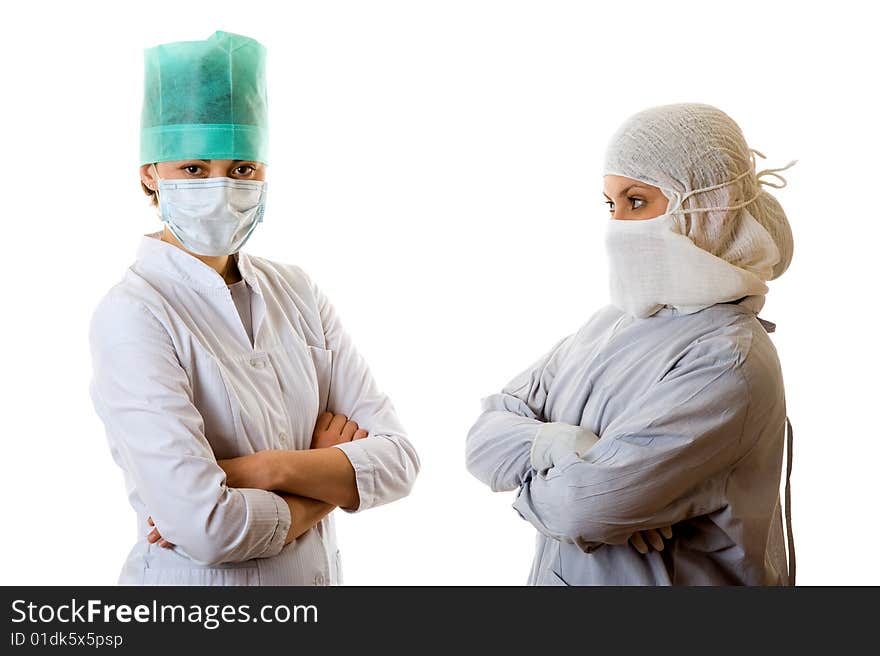 Portrait of two young doctors. Isolated on white background