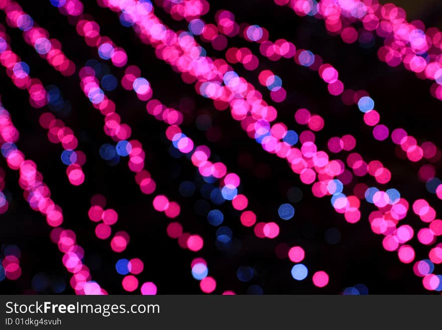 This is abstract background with unfocused lcolorful light sources