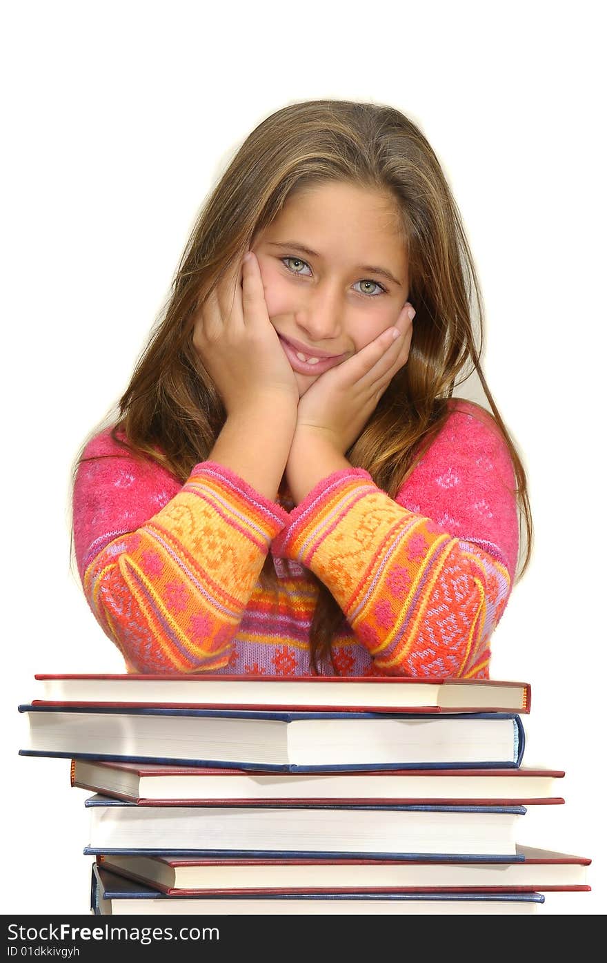 Beautiful young girl posing with books against a white background. Beautiful young girl posing with books against a white background