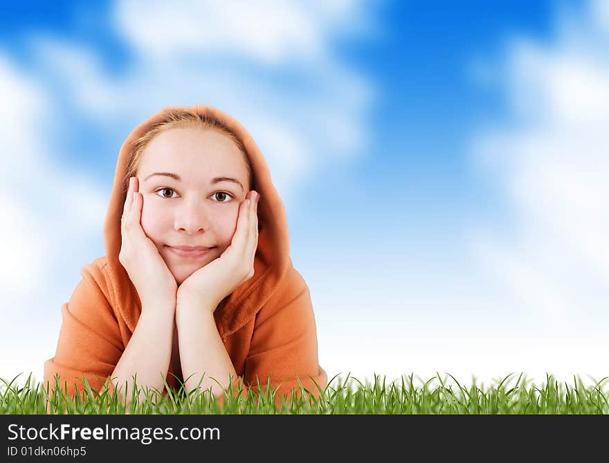 Woman On A Meadow In Grass