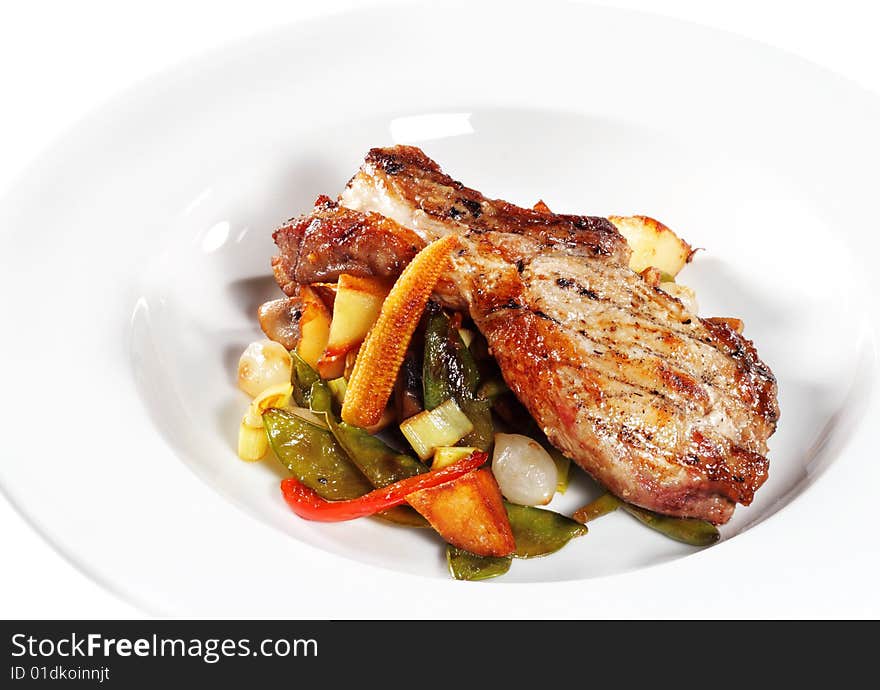 Brisket of Pork with Vegetables. Isolated on White Background