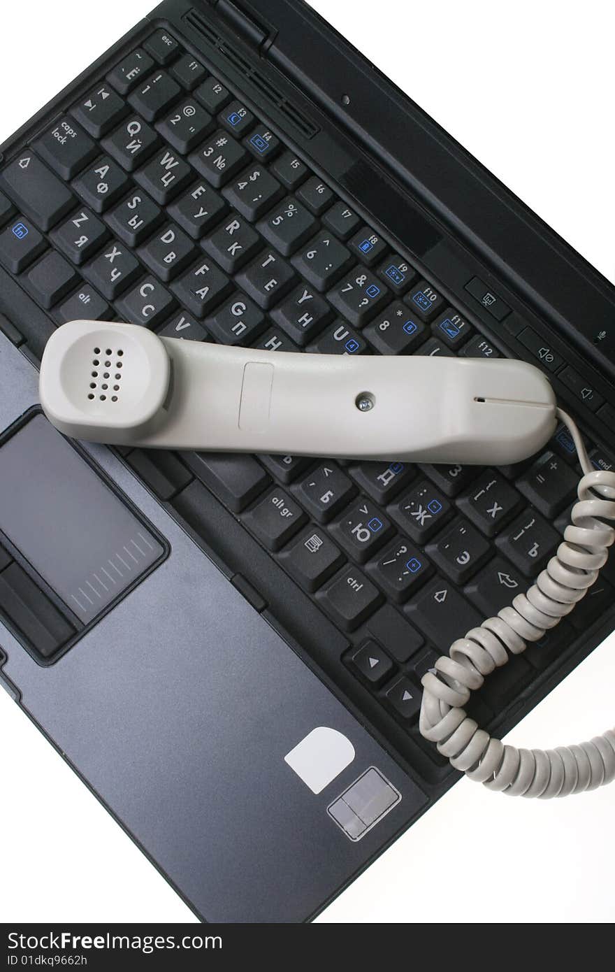 Computer and phone isolated on a white background. Computer and phone isolated on a white background