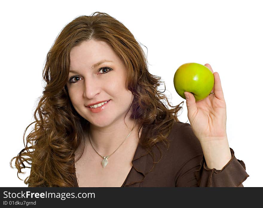 Pretty Woman Smiling and Holding a Fresh Green Apple symbolizing healthy eating and living. Pretty Woman Smiling and Holding a Fresh Green Apple symbolizing healthy eating and living