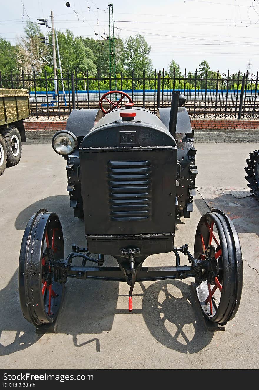 Iron tractor with iron wheels. Iron tractor with iron wheels