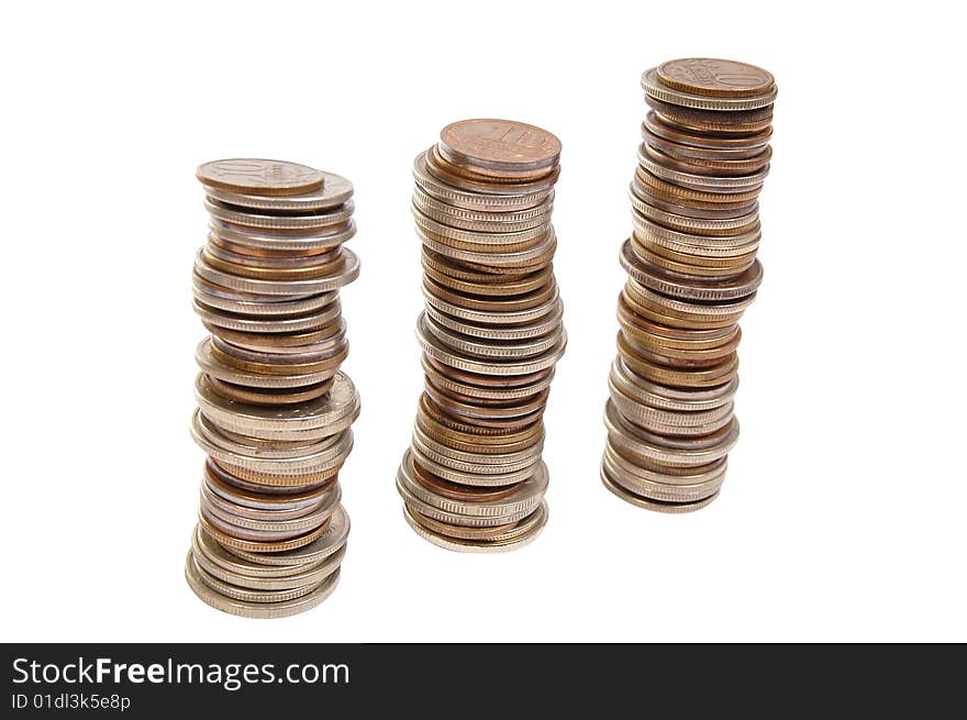 Coins stacks isolated on a white. Coins stacks isolated on a white