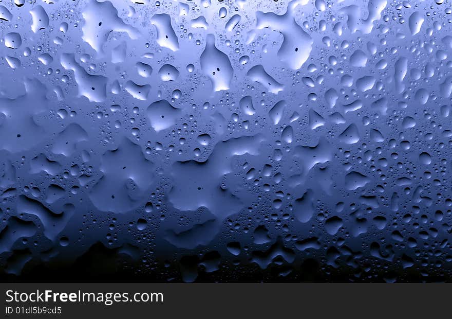 Some water drops on blue background