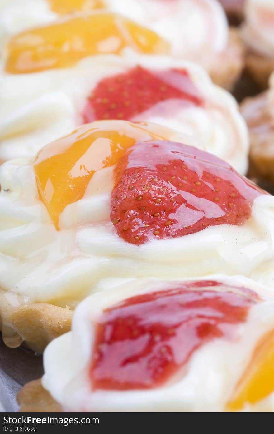 Fruit cakes with strawberry and peach