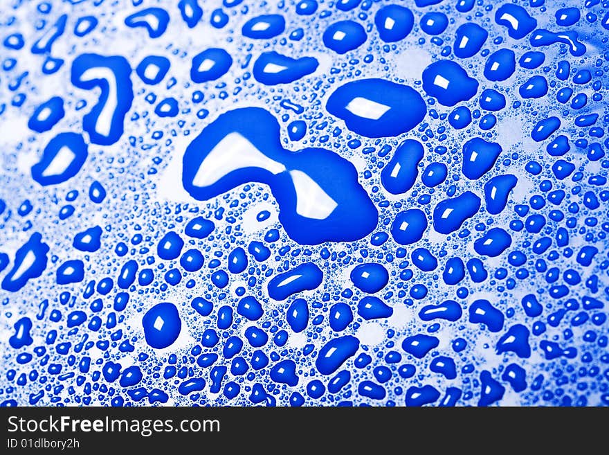 Some water drops on blue background