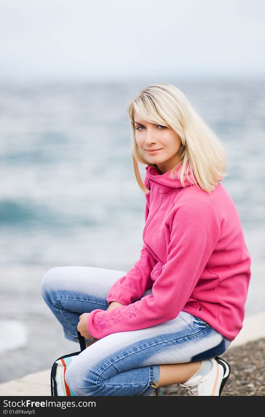 Woman Relaxing Near The Ocean