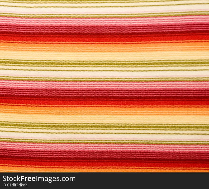 Material texture with orange, red and green colors. Material texture with orange, red and green colors