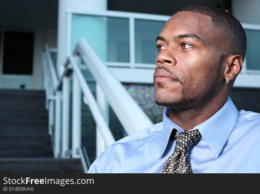 Profile headshot of a man looking away