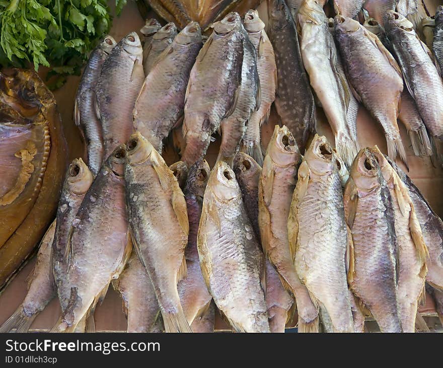 A selection of air cured fish laid out for display on a roadside stall. Typical of Ukraine and other western ex soviet block countries. Often consumed as an accompaniment to alcohol. A selection of air cured fish laid out for display on a roadside stall. Typical of Ukraine and other western ex soviet block countries. Often consumed as an accompaniment to alcohol.