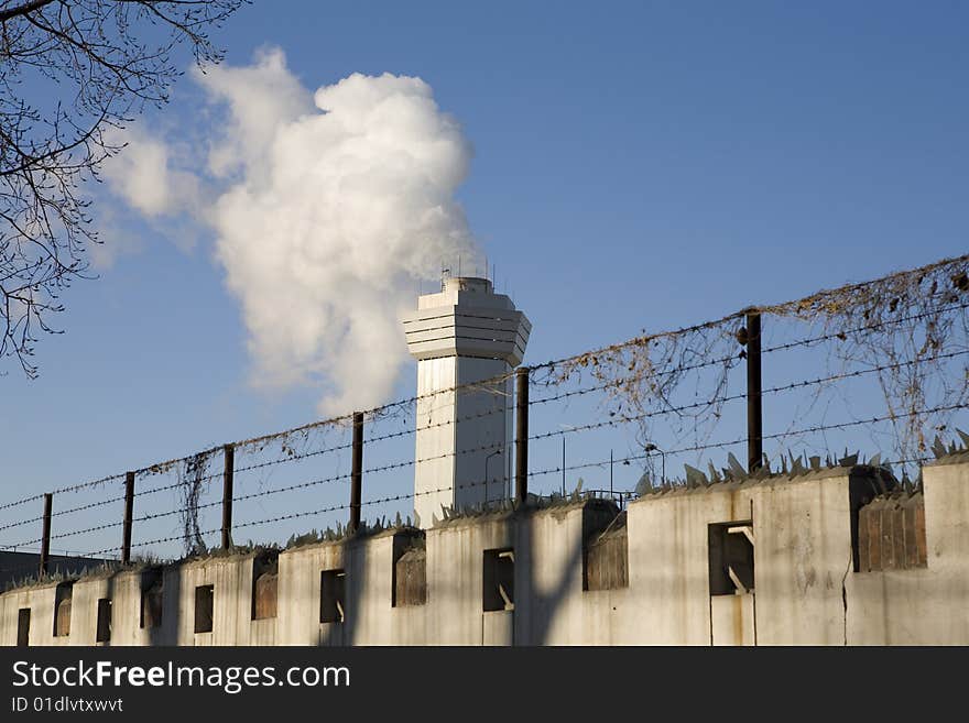 Large cloud of steam coming from a stack. Large cloud of steam coming from a stack