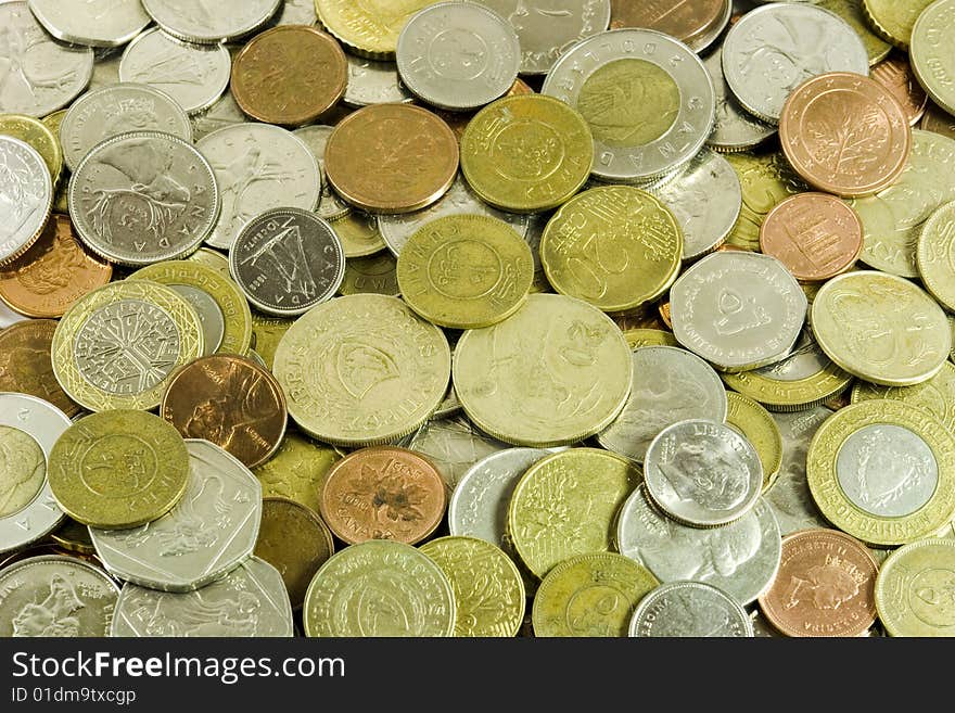 Coins of different countries heaped