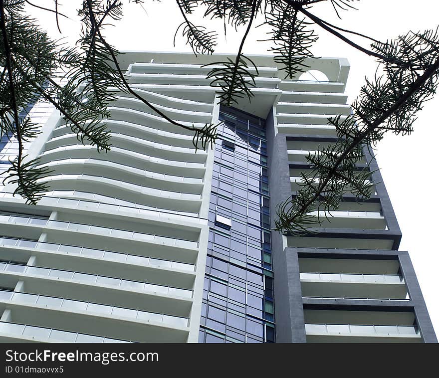 A skyscraper tower isolated on a white background. A skyscraper tower isolated on a white background