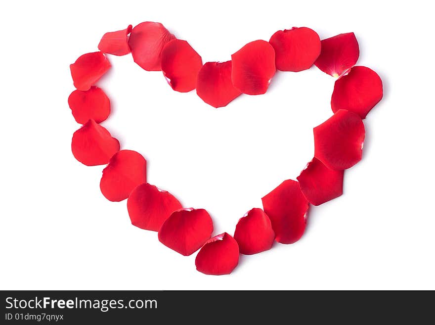 Heart of red rose petals isolated on white