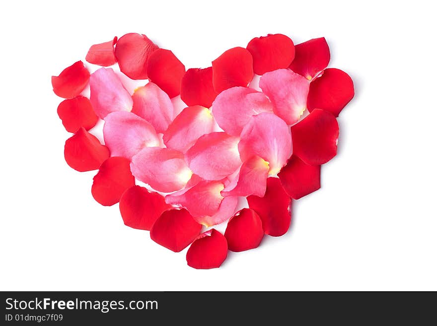 Heart of red rose petals isolated on white