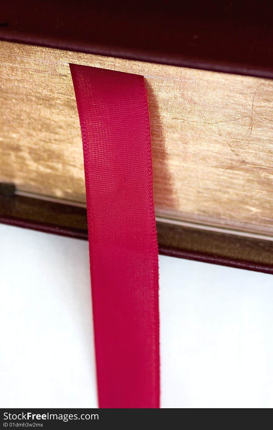 Closeup of a bible with a red ribbon