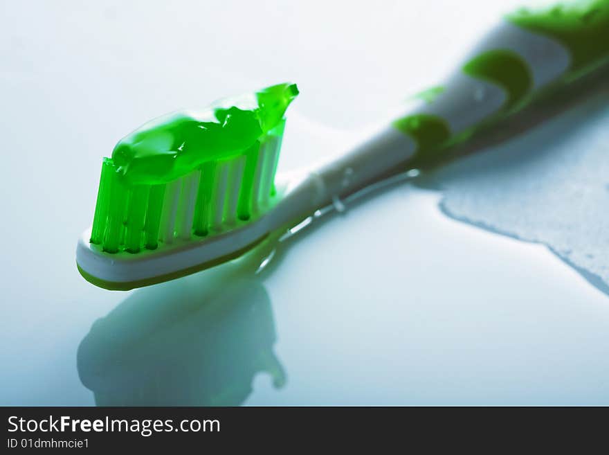 Toothbrush with green paste