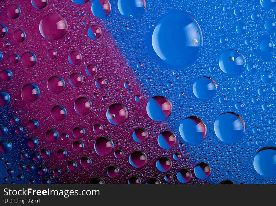 Blue and pink water drops