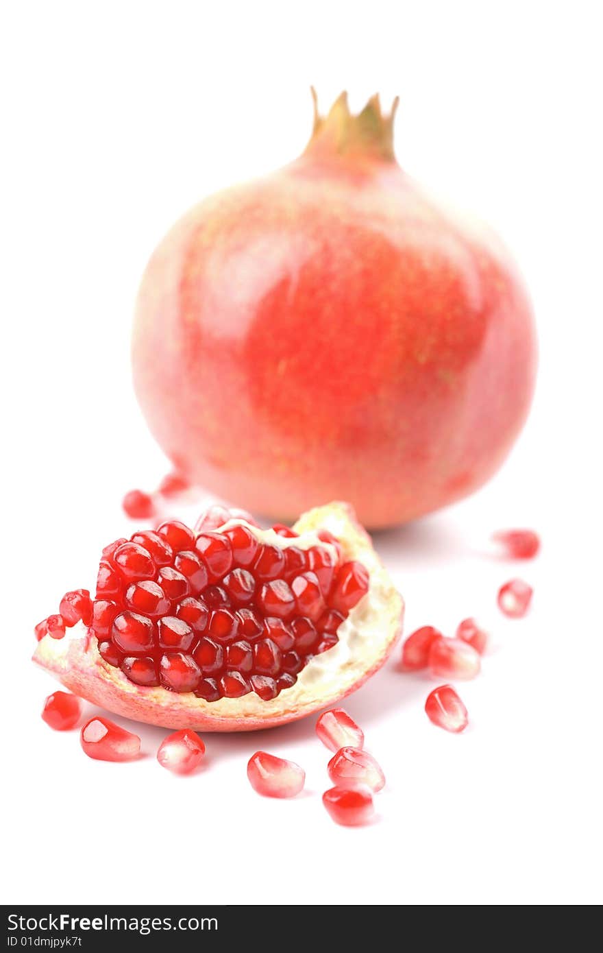 Ripe pomegranate isolated on white