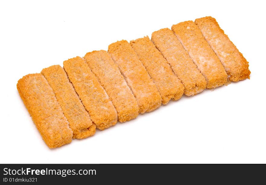 Frozen fish nuggets isolated at white