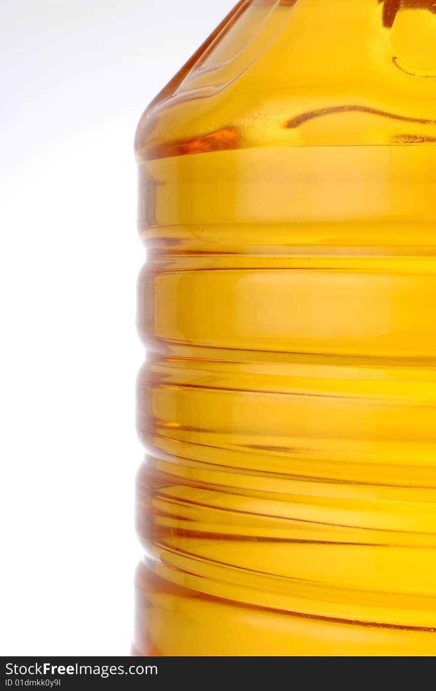 Oil bottle detail isolated at white