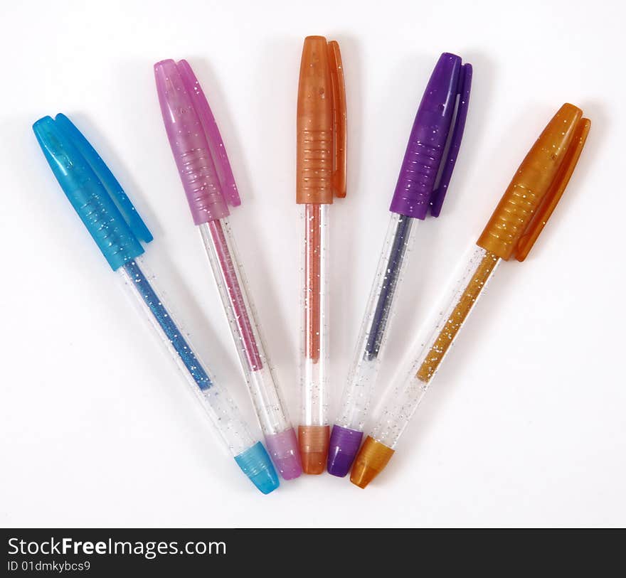 Colorful pens isolated at white