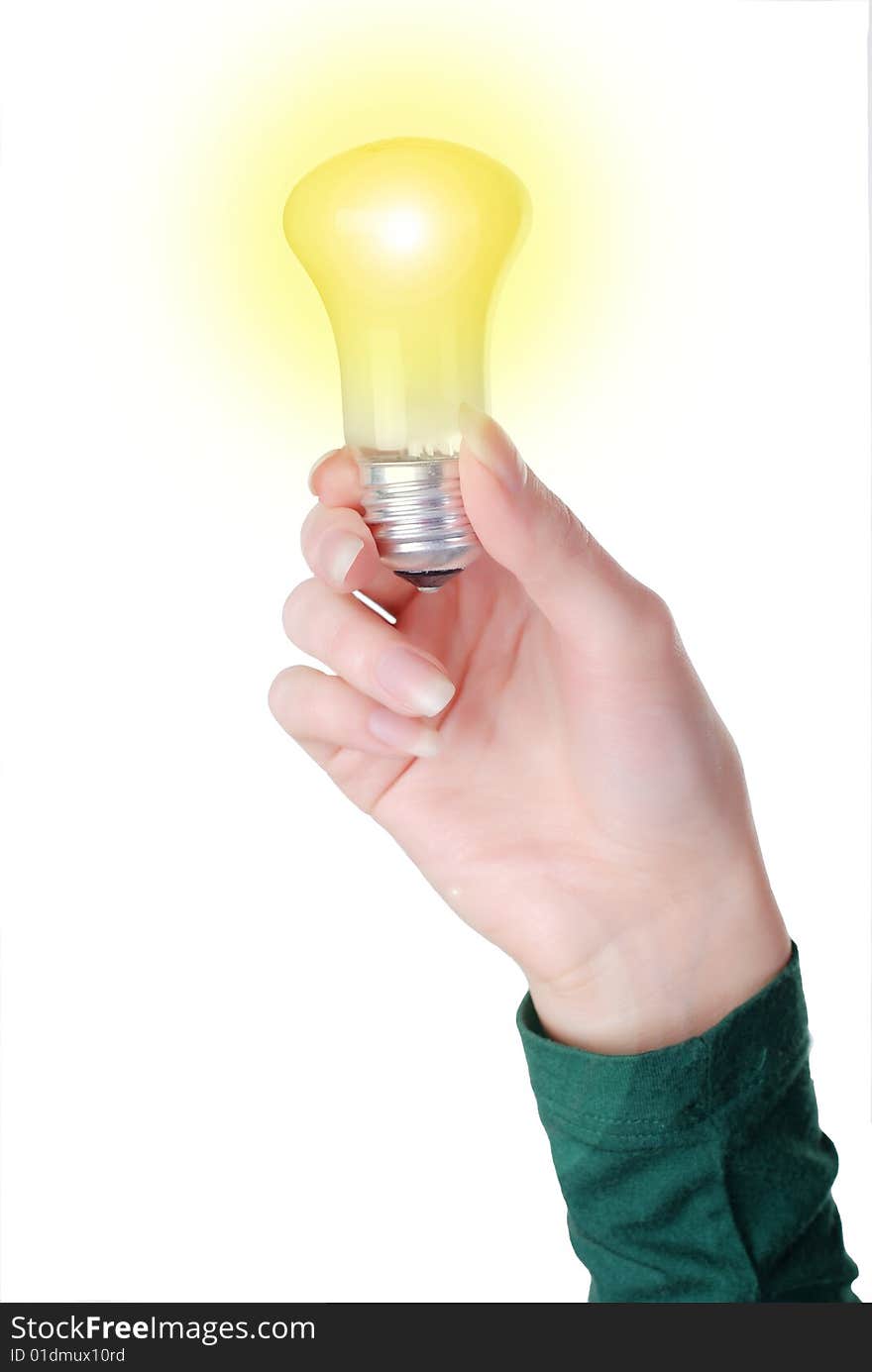 Hand of a woman with lamp on the white background. Hand of a woman with lamp on the white background