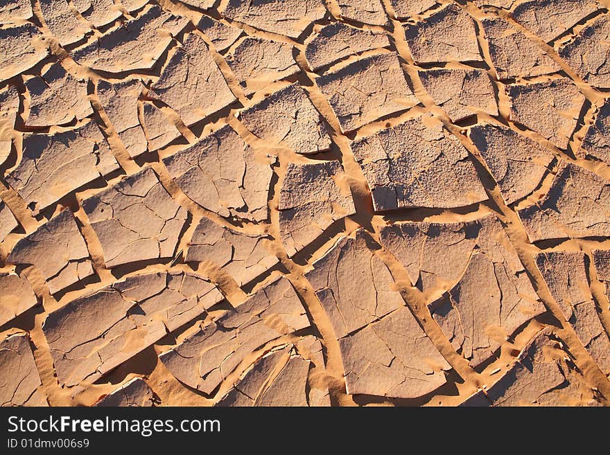 Cracked ground in Sahara desert region