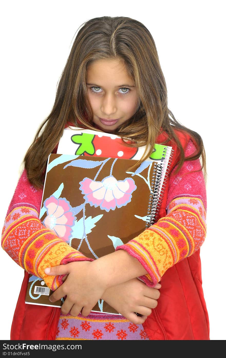 Beautiful young girl posing against a white background. Beautiful young girl posing against a white background