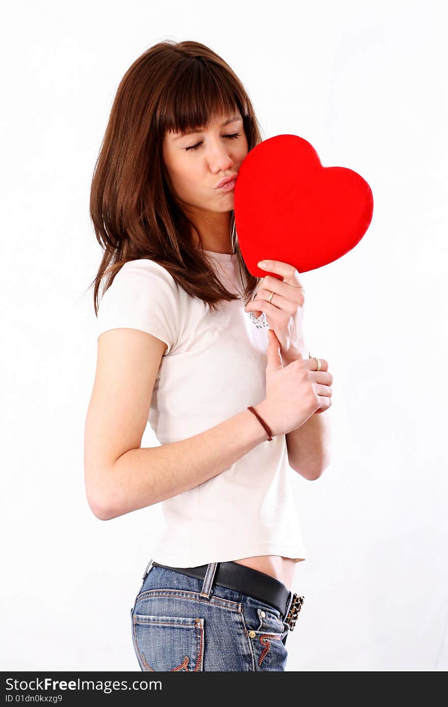 Woman with red heart isolater on white. Woman with red heart isolater on white