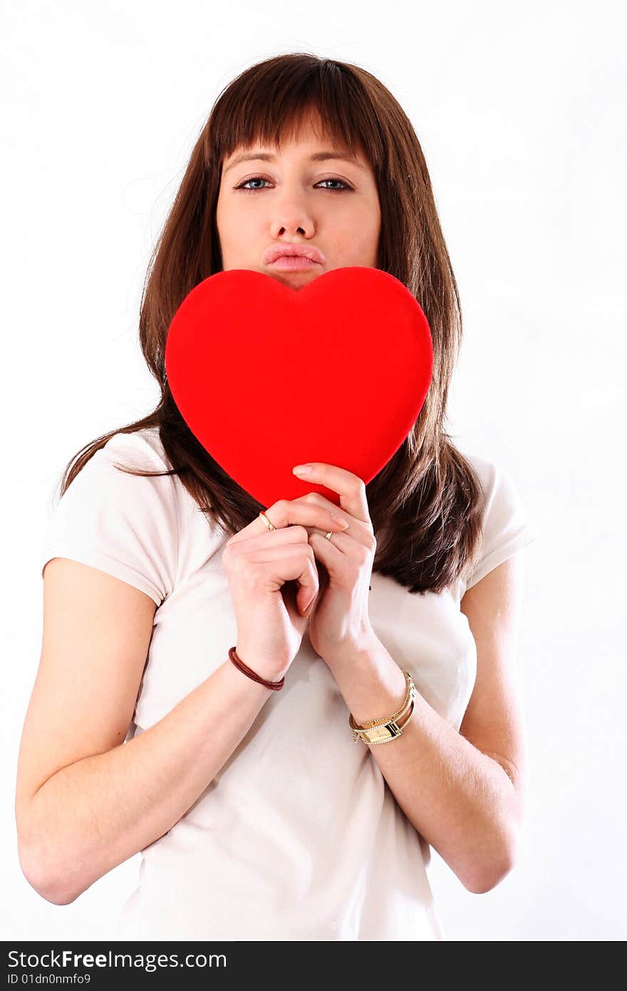 Woman with red heart isolater on white. Woman with red heart isolater on white