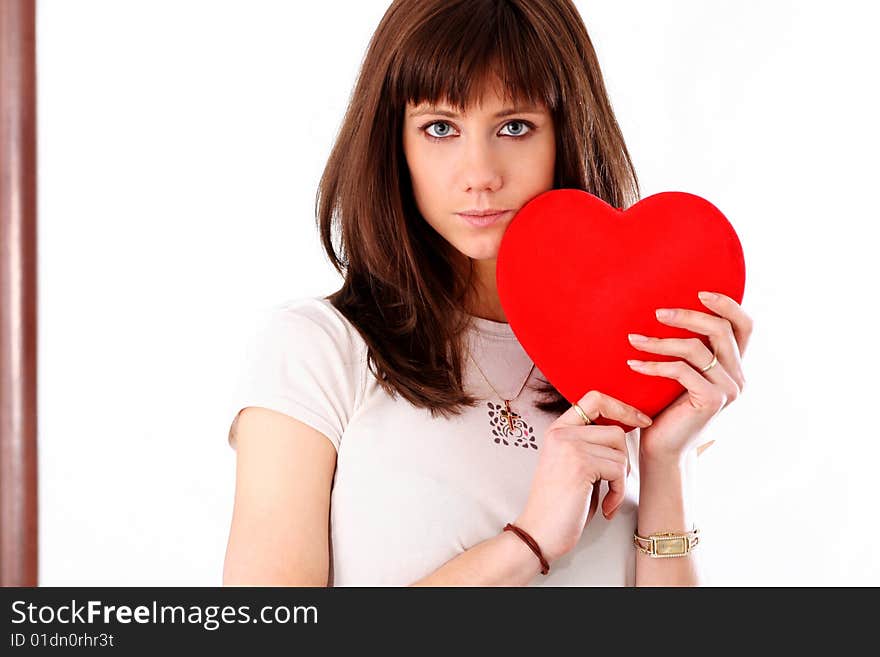 Woman with red heart isolater on white. Woman with red heart isolater on white