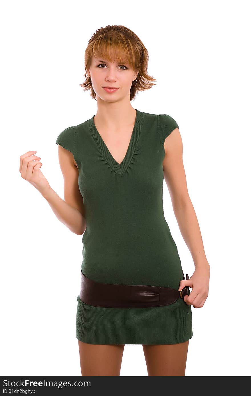 Portrait of the brunette in a dark green dress on a white background. Isolated. Portrait of the brunette in a dark green dress on a white background. Isolated